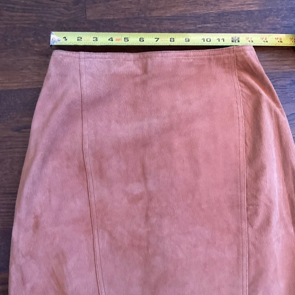 True vintage suede—real leather with clean tailoring an earlier designer era.